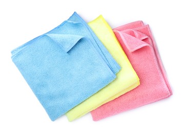 Photo of Colorful microfiber cloths on white background, top view