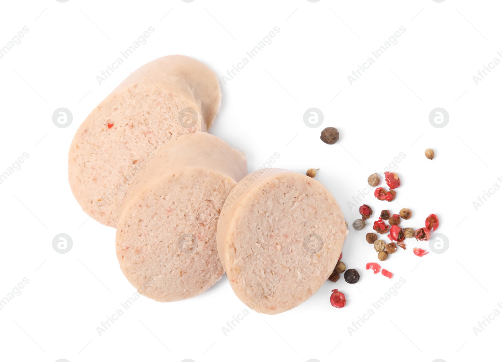 Photo of Slices of delicious liver sausage and peppercorns on white background, top view