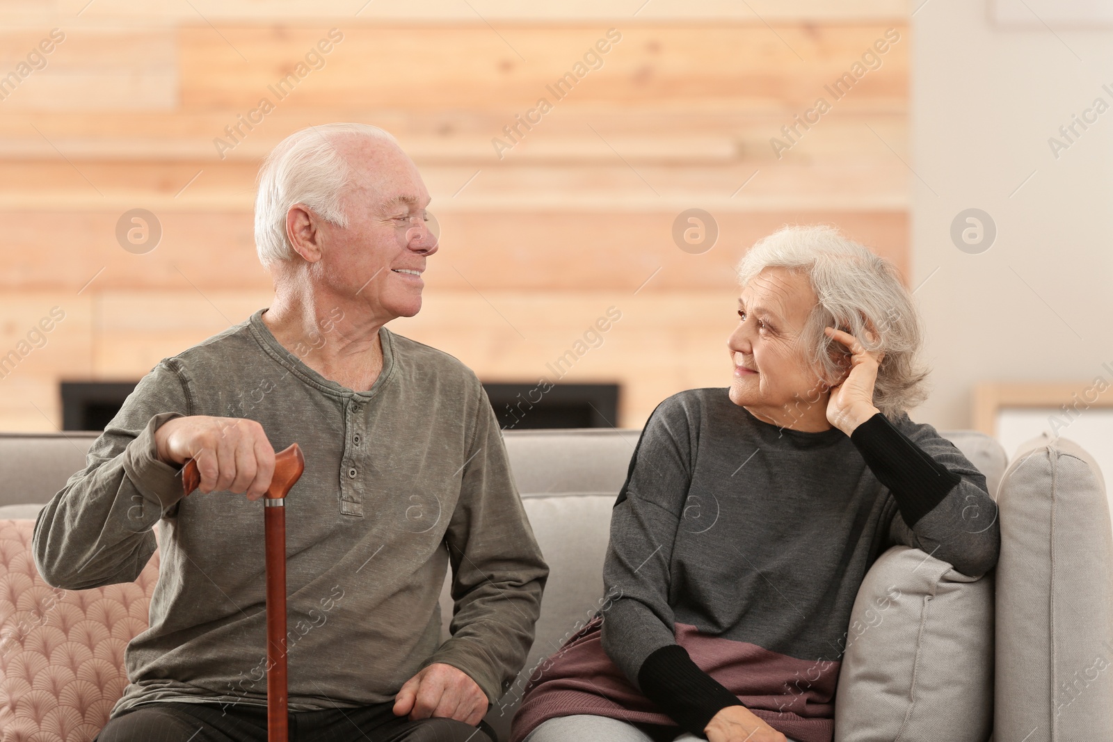 Photo of Portrait of elderly spouses in living room