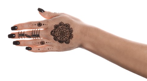 Woman with henna tattoo on hand against white background, closeup. Traditional mehndi ornament