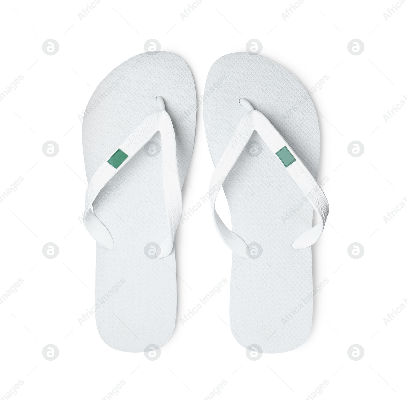 Photo of Pair of stylish flip flops isolated on white, top view