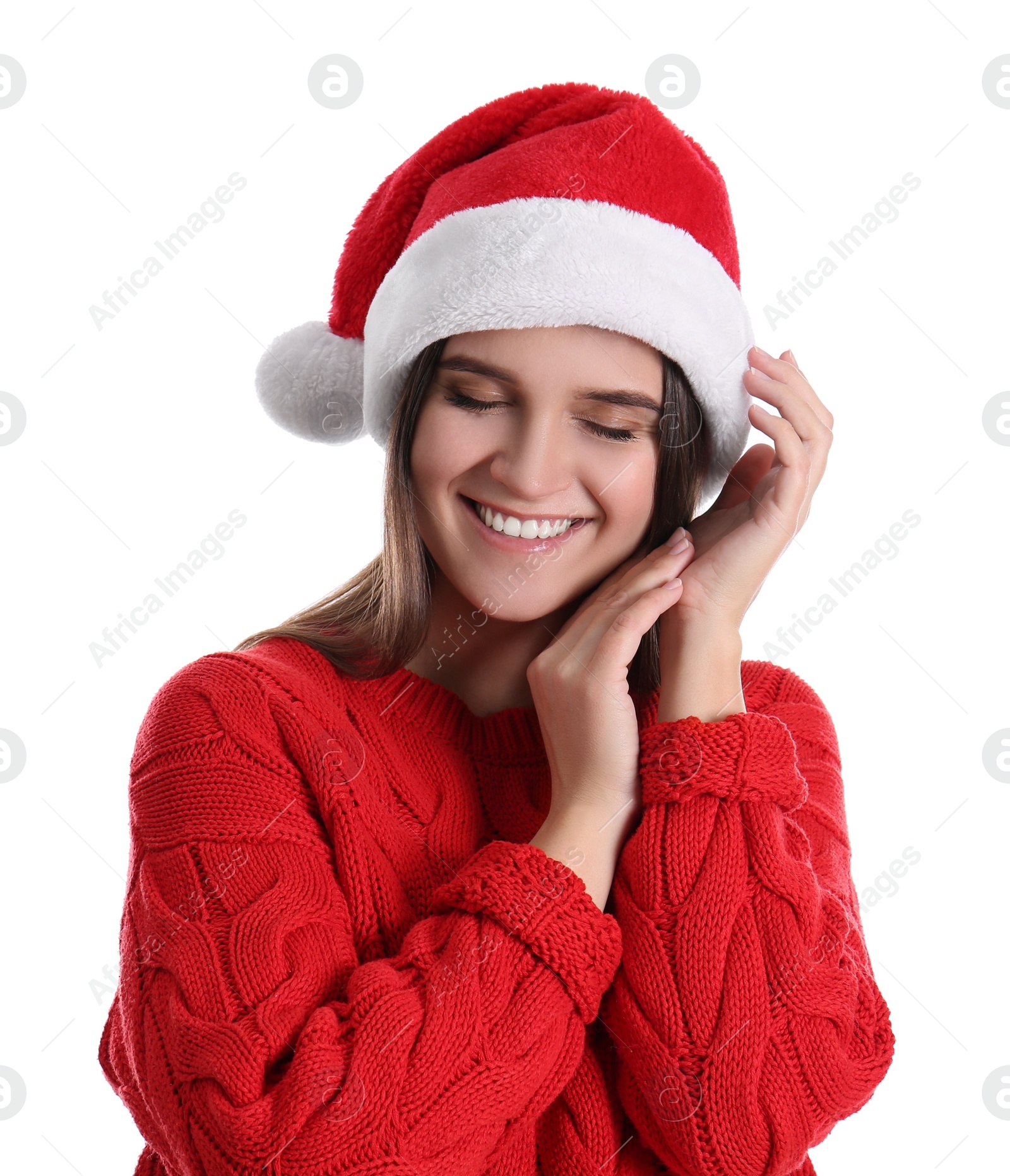 Photo of Pretty woman in Santa hat and red sweater on white background