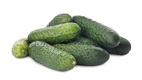 Photo of Heap of fresh ripe cucumbers on white background