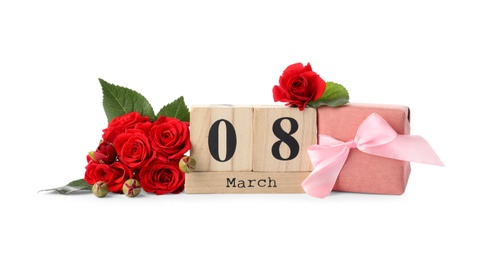 Photo of Wooden block calendar with date 8th of March, roses and gift box on white background. International Women's Day