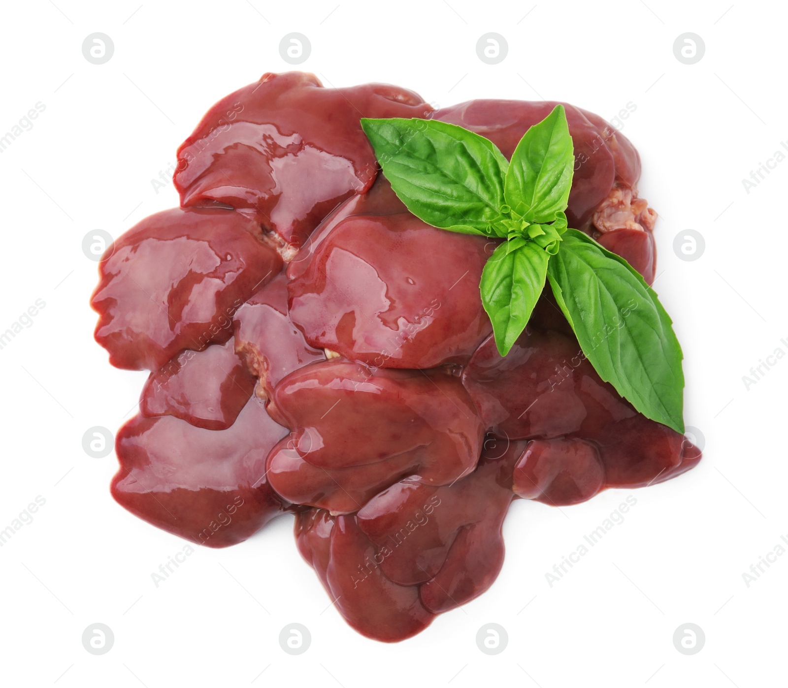 Photo of Pieces of raw chicken liver and basil isolated on white, top view