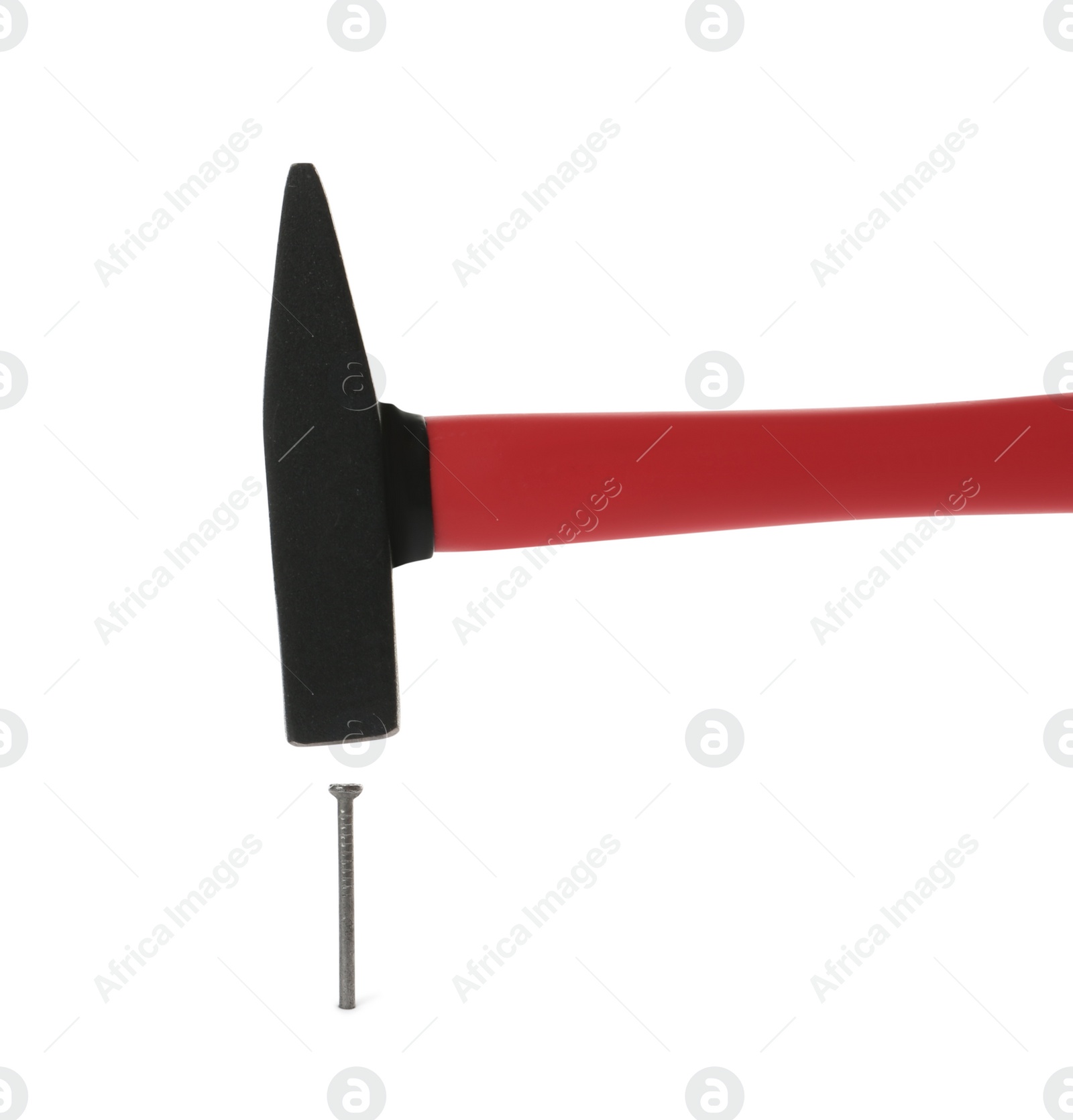 Photo of Hammer and metal nail on white background