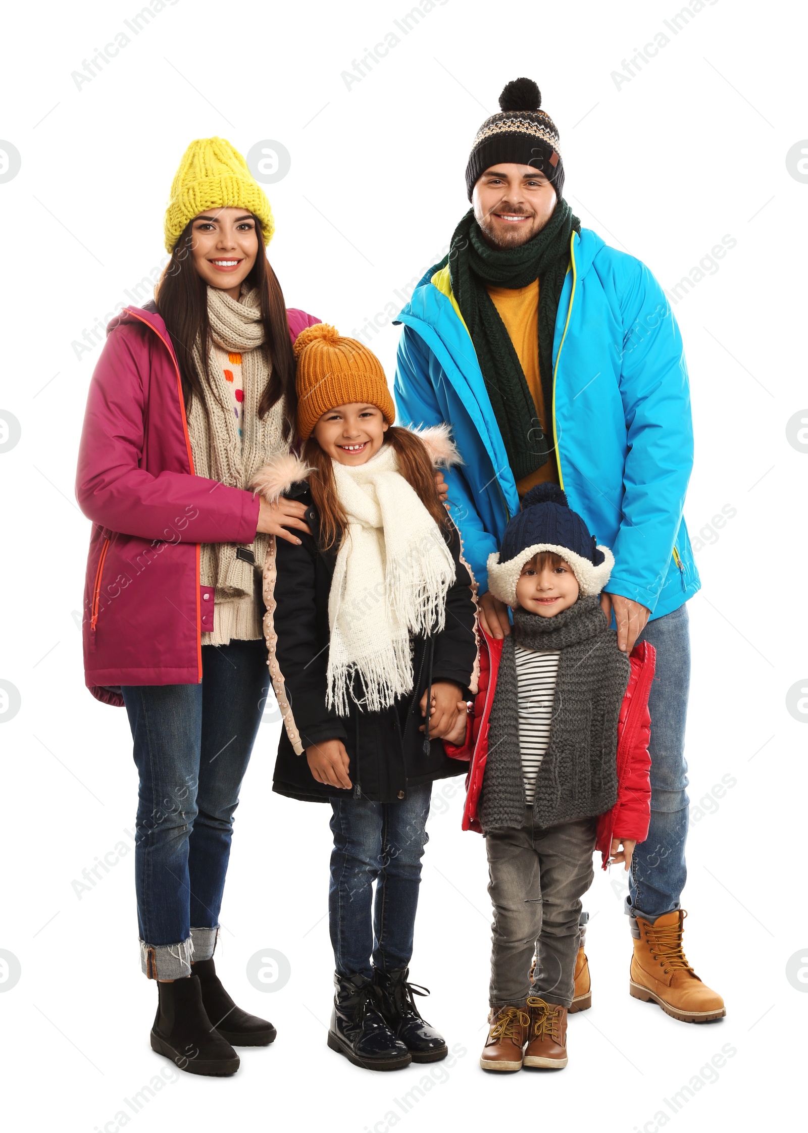 Photo of Happy family in warm clothes on white background. Winter vacation