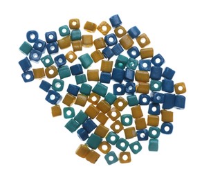 Photo of Pile of blue and yellow beads on white background, top view