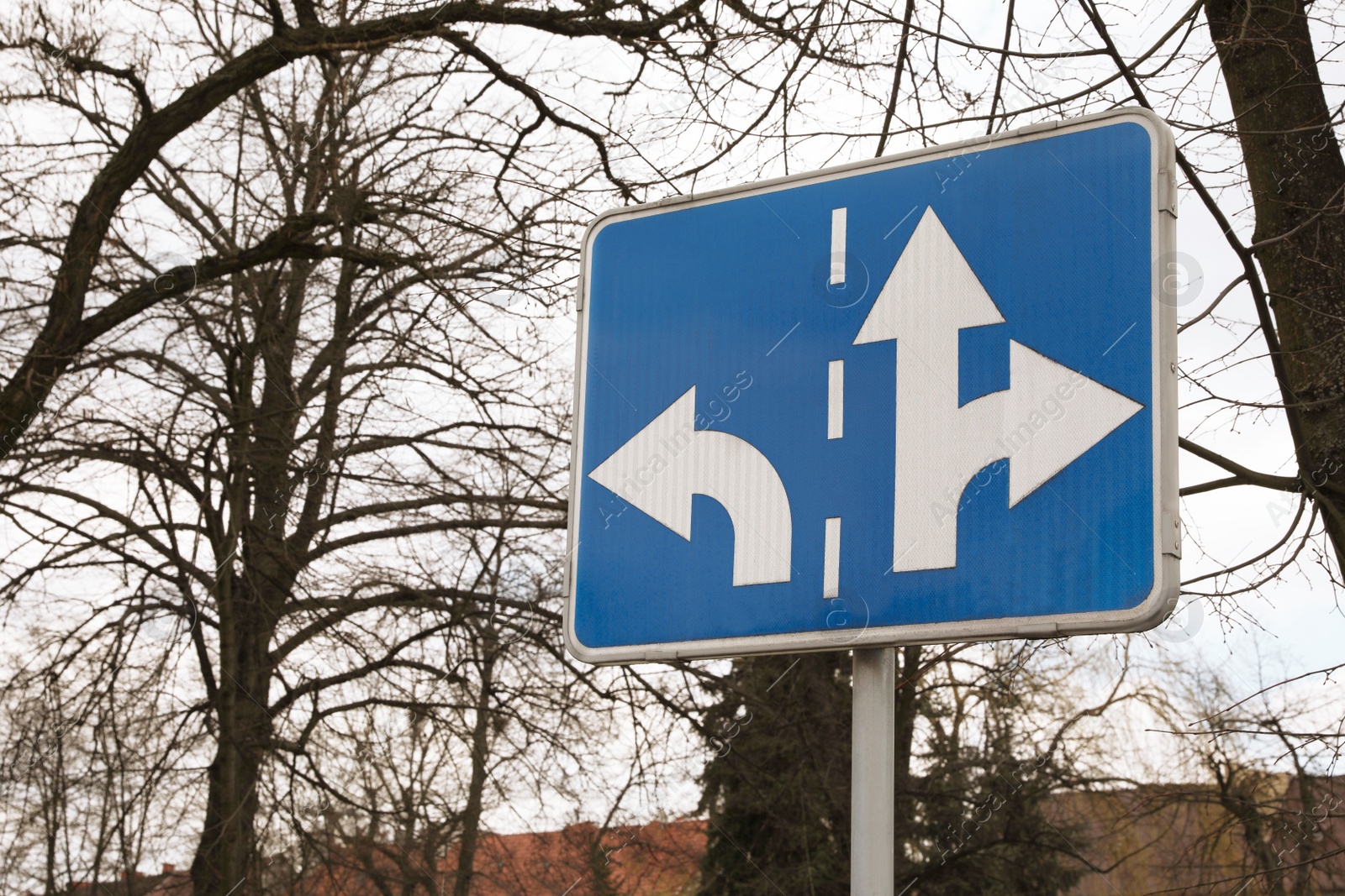 Photo of Traffic sign Road Direction outdoors on sunny day