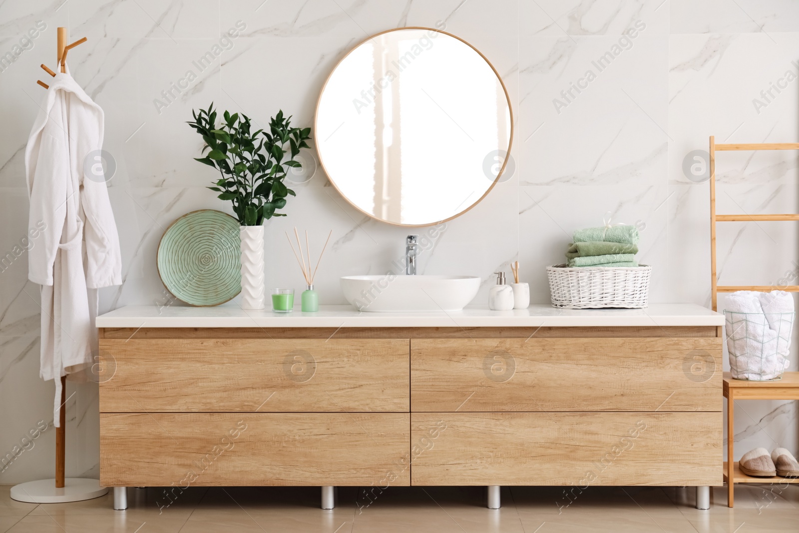 Photo of Modern bathroom interior with stylish mirror and vessel sink