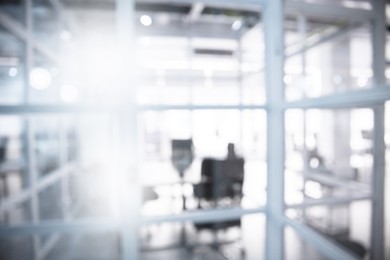 Image of Office interior. Blurred view of comfortable workspace