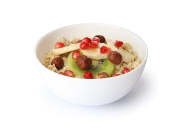 Photo of Bowl of quinoa porridge with hazelnuts, kiwi, banana and pomegranate seeds on white background