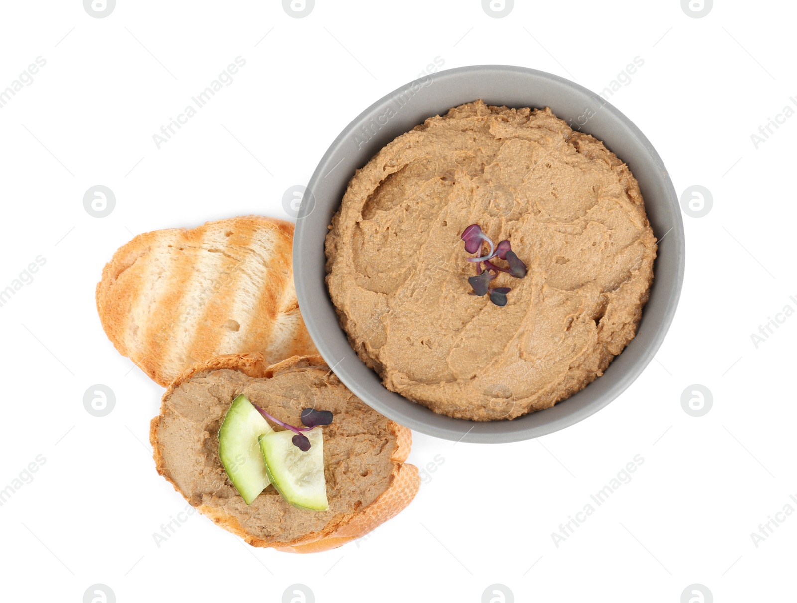 Photo of Bowl and fresh bread with delicious liver pate on white background, top view