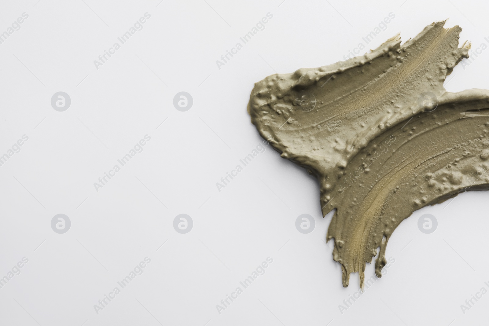 Photo of Sample of facial mask isolated on white, top view