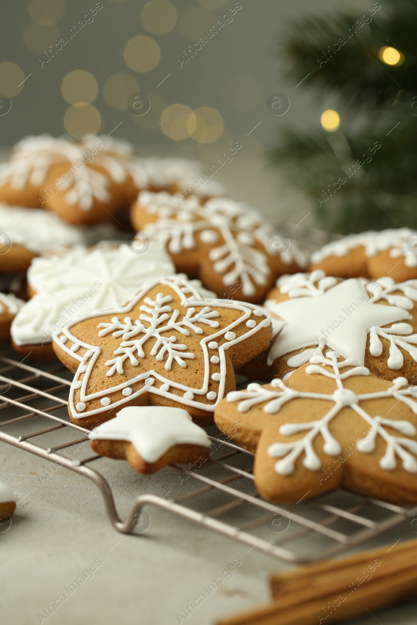 Photo of Tasty Christmas cookies with icing on table, closeup