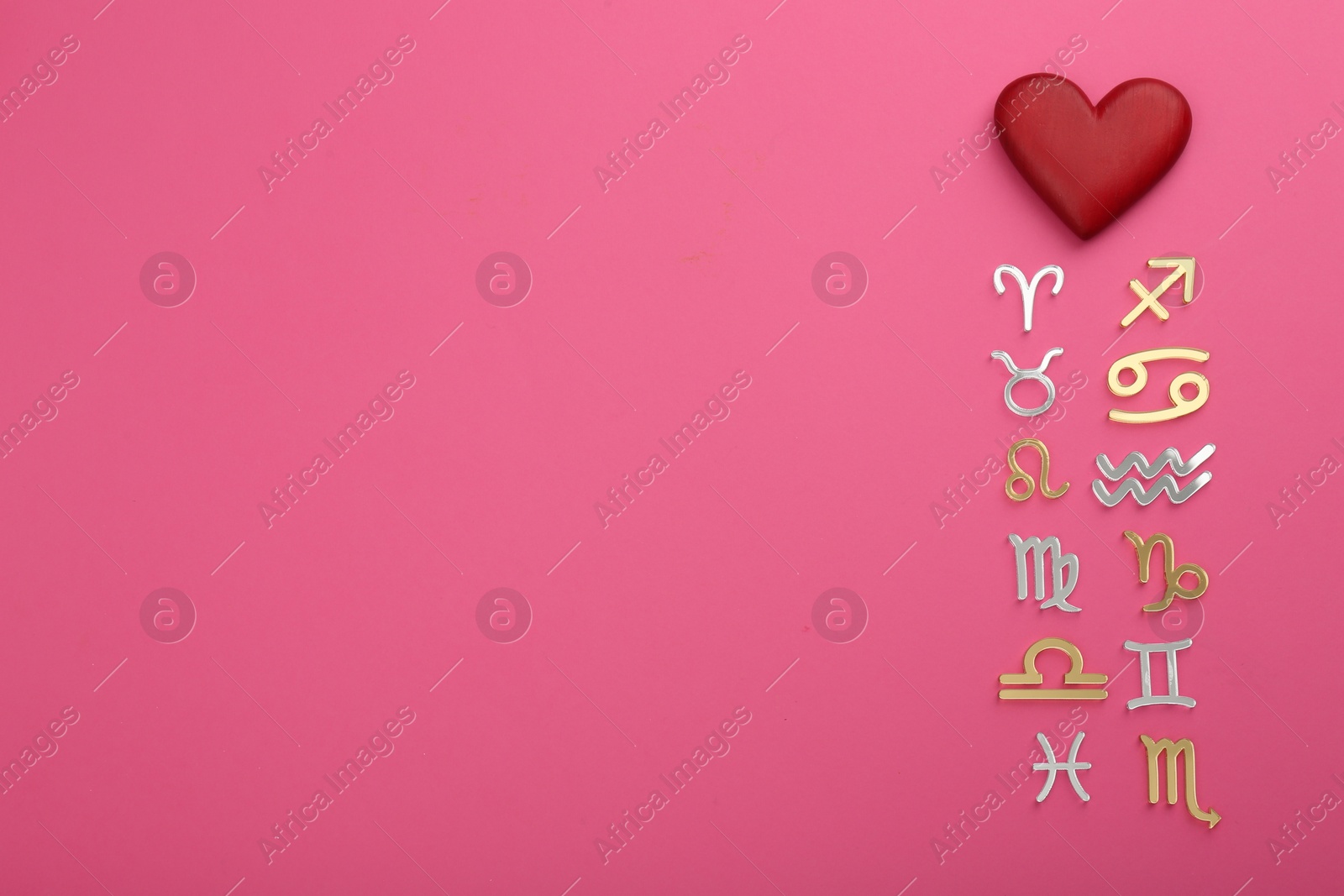 Photo of Zodiac compatibility. Signs with red heart on pink background, flat lay. Space for text
