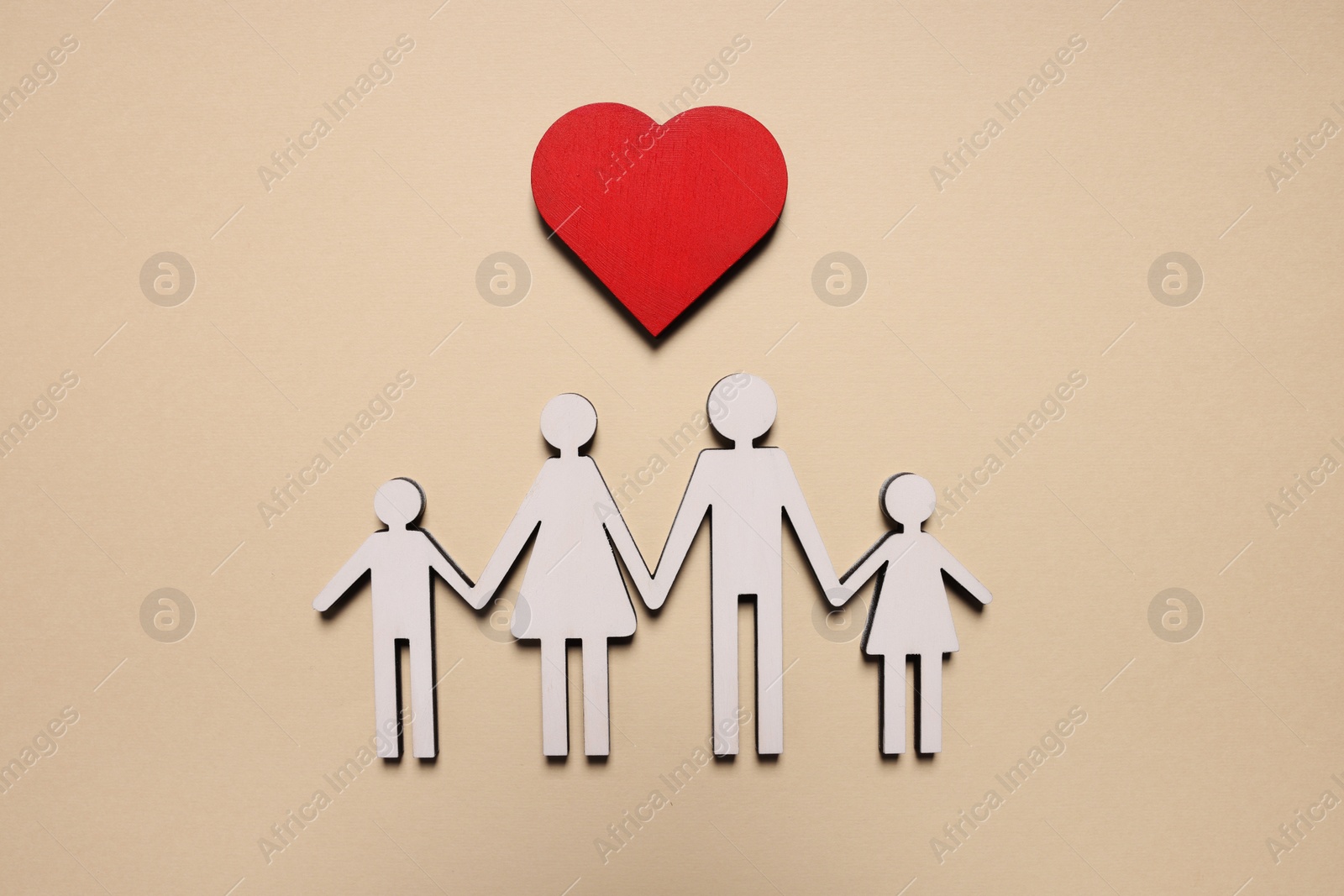 Photo of Figures of family and heart on beige background, top view. Insurance concept