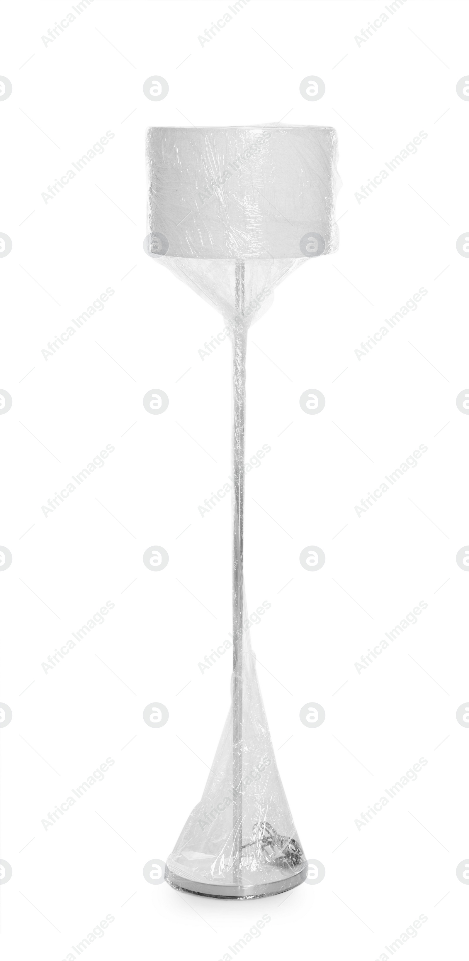 Photo of Lamp wrapped in stretch film on white background