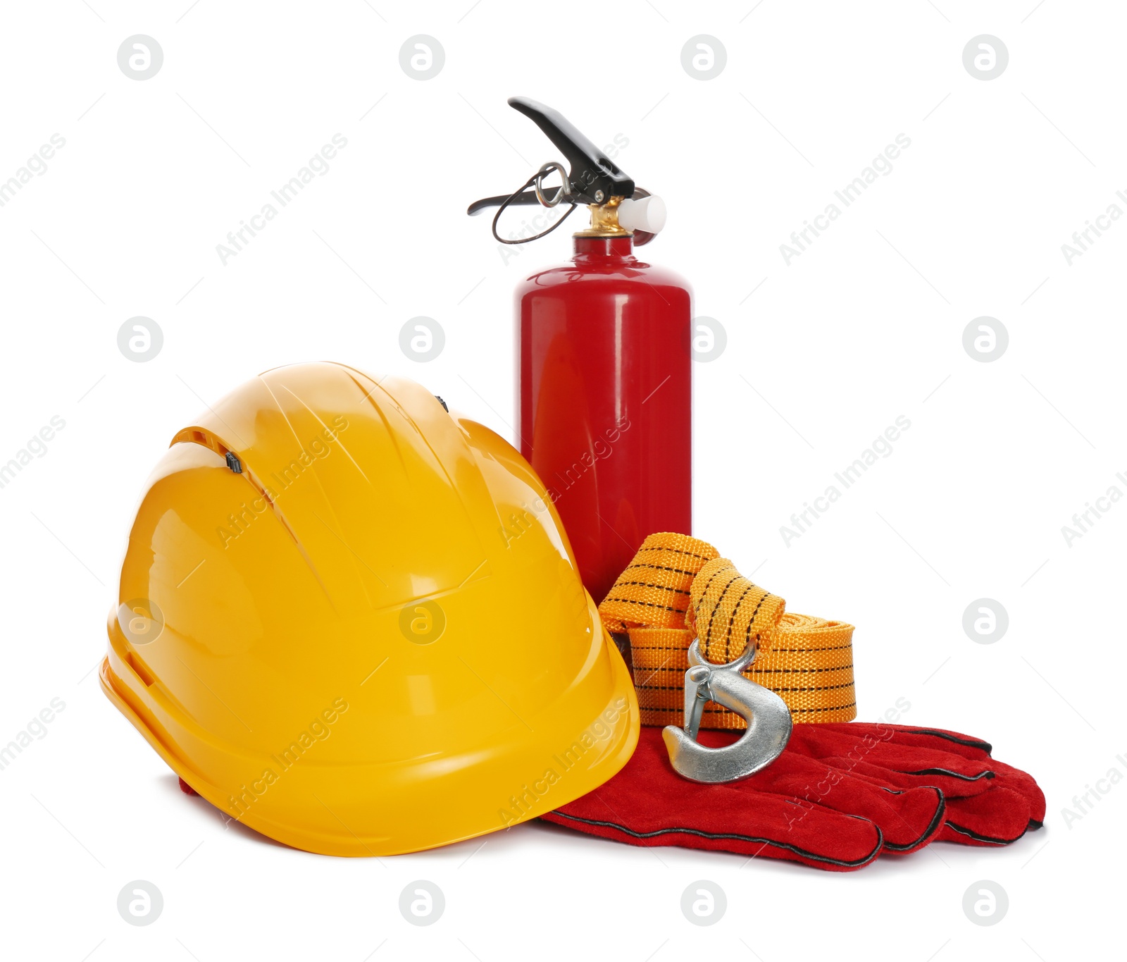 Photo of Protective workwear and fire extinguisher on white background. Safety equipment