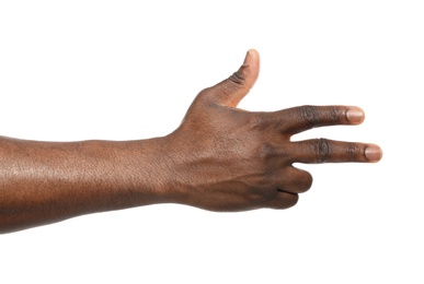 Photo of African-American man showing hand gesture on white background, closeup