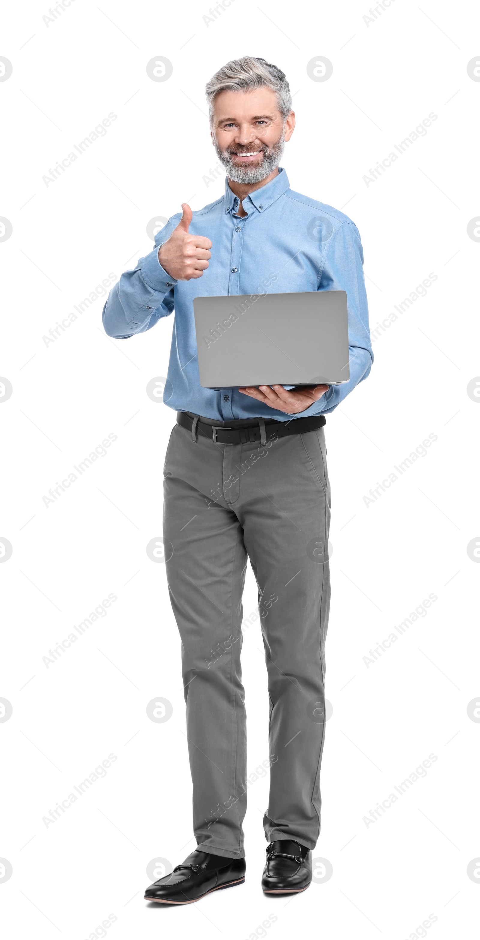 Photo of Mature businessman in stylish clothes with laptop on white background