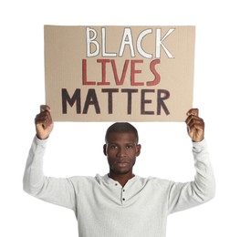 Photo of African American man holding sign with phrase Black Lives Matter on white background. Racism concept