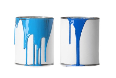 Photo of Open paint cans with stains isolated on white