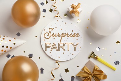 Flat lay composition with different items for surprise party on white background