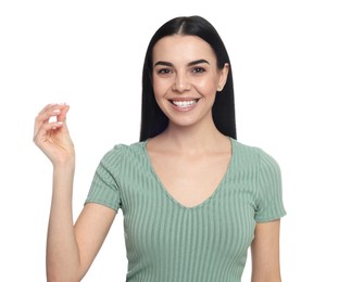 Photo of Young woman snapping fingers on white background