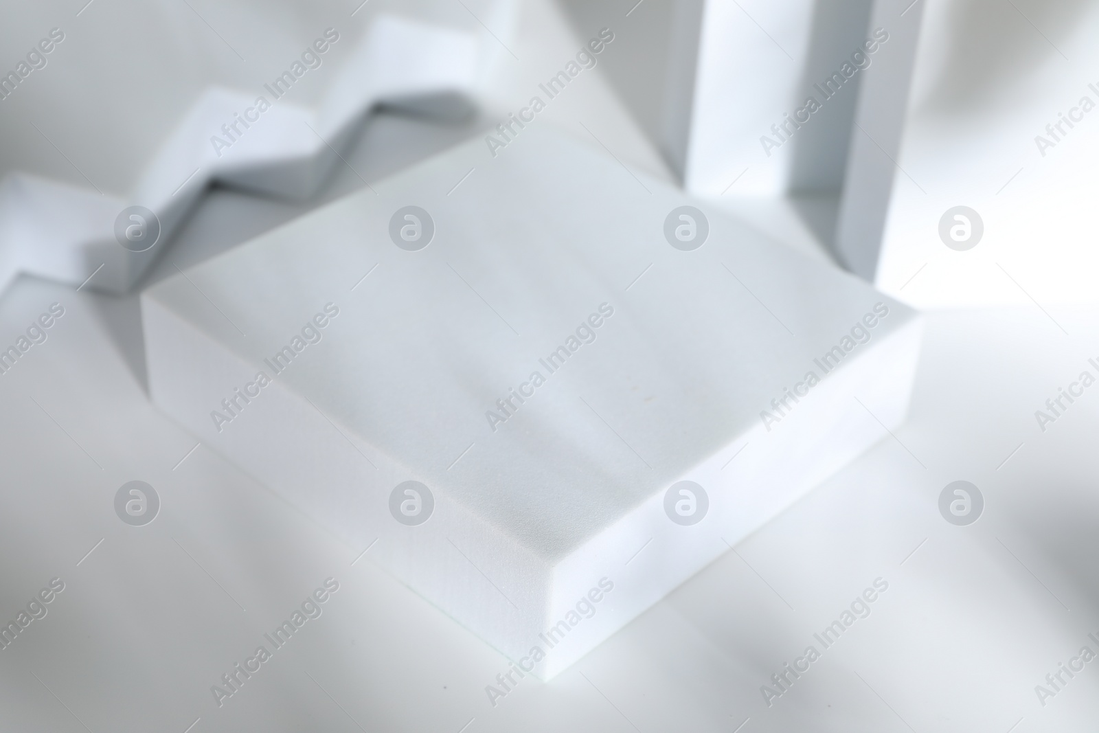 Photo of Presentation of product. Podium on white background, space for text