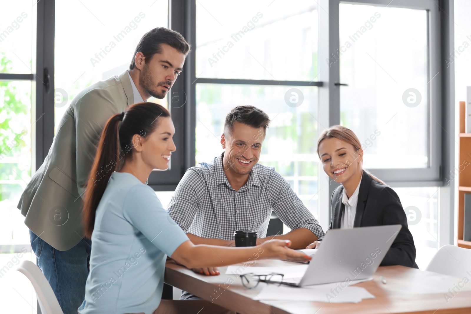 Photo of Office employees having business training at workplace