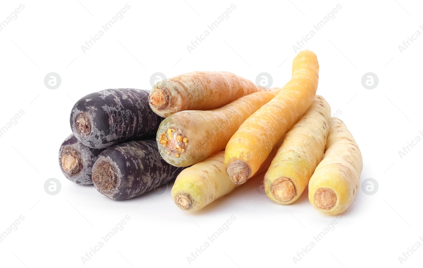 Photo of Different tasty raw carrots isolated on white