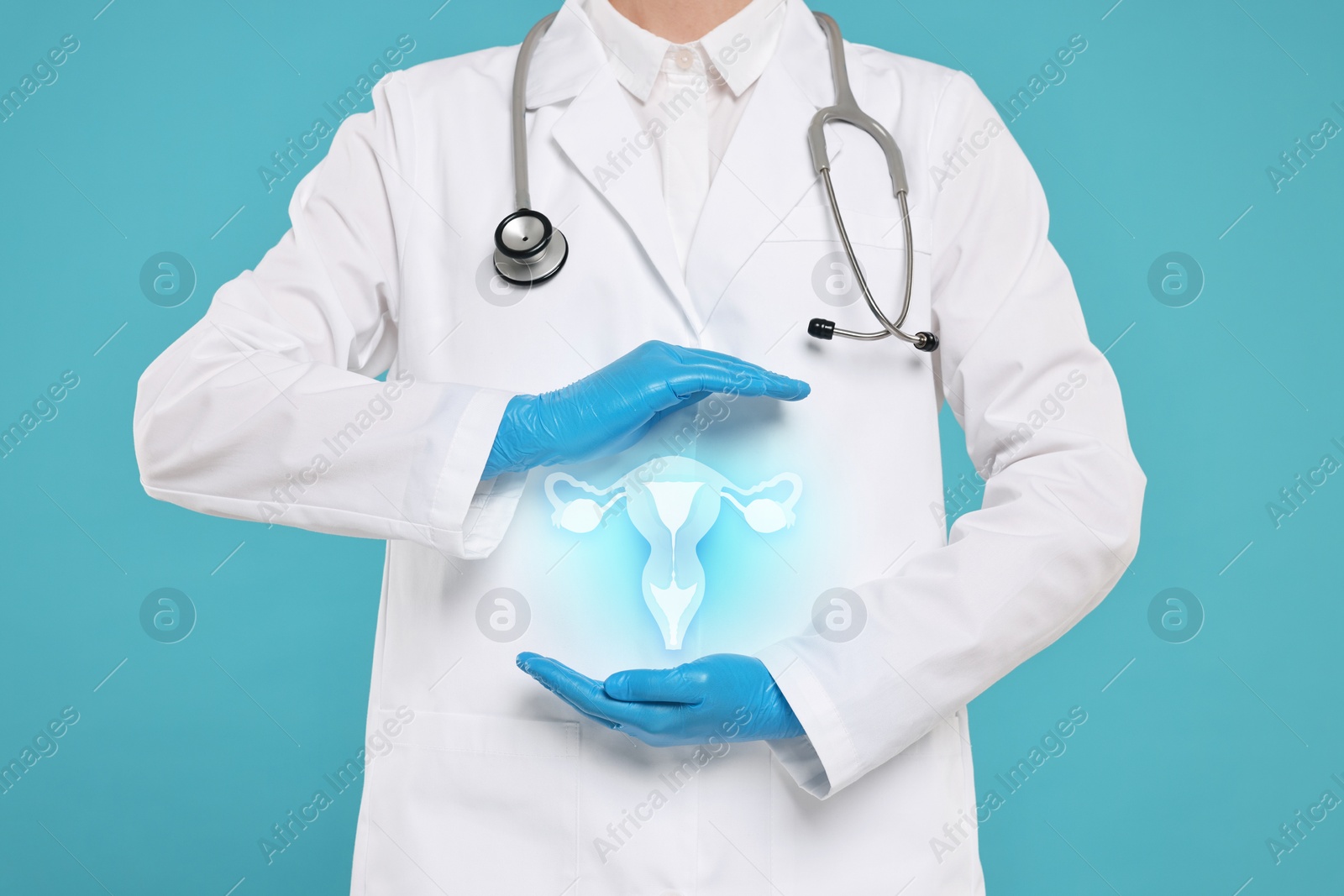 Image of Doctor and illustration of female reproductive system on light blue background, closeup