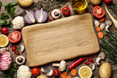 Photo of Flat lay composition with fresh products on wooden table, space for text. Healthy cooking