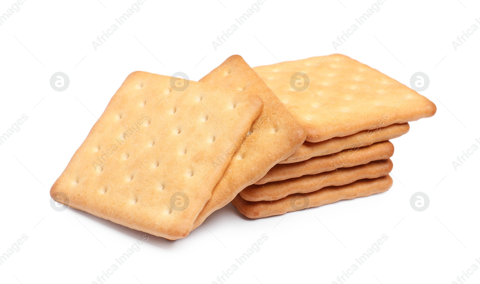 Photo of Tasty crispy square crackers isolated on white