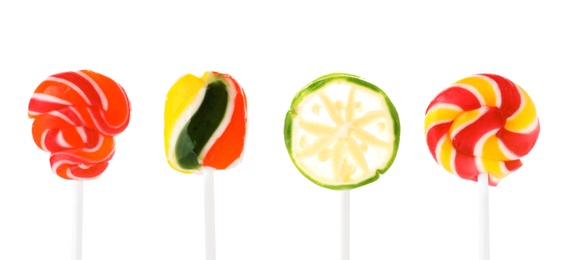 Photo of Different tasty colorful candies on white background