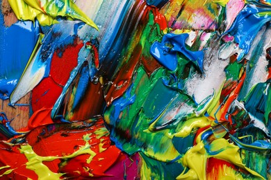 Abstract colorful acrylic paint as background, top view