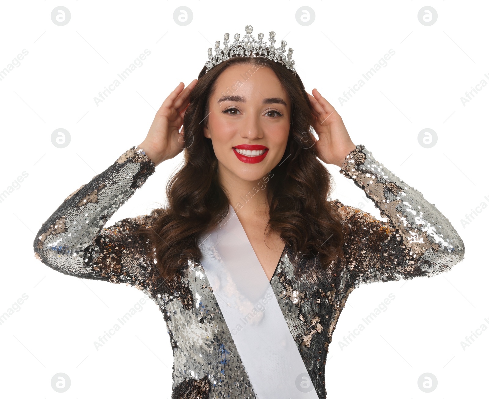 Photo of Beautiful young woman with tiara and ribbon in dress isolated on white. Beauty contest