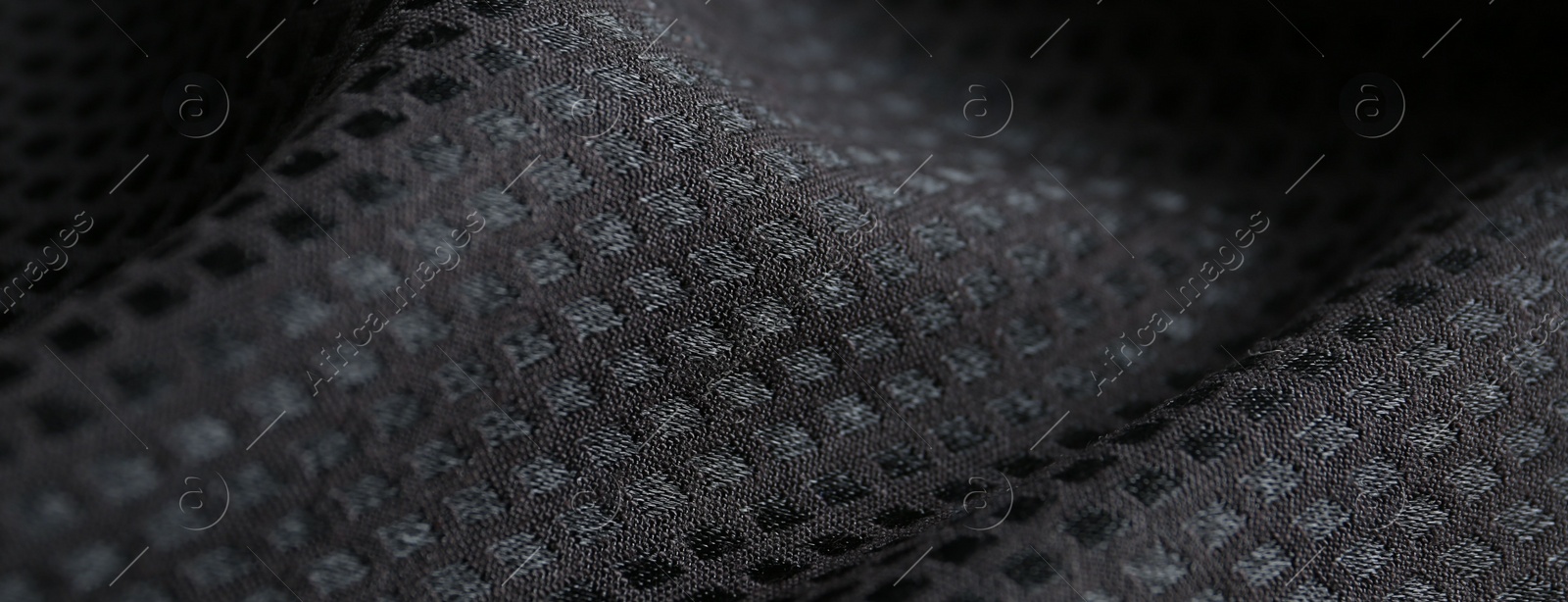 Photo of Textured black fabric as background, closeup view