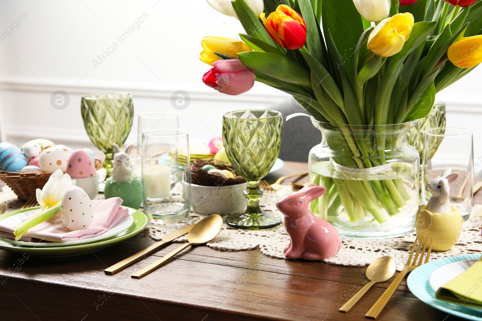 Photo of Festive table setting with beautiful flowers. Easter celebration