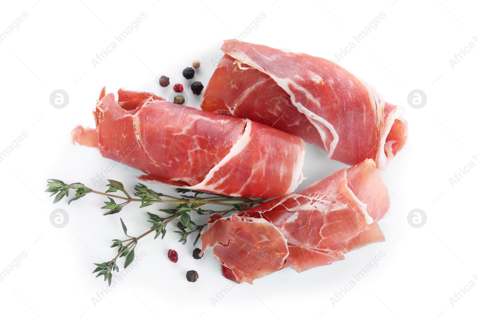 Photo of Tasty prosciutto on white background, top view