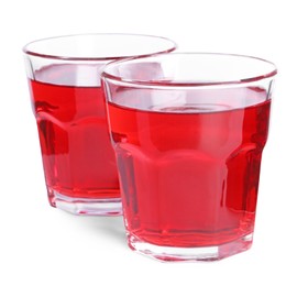 Tasty cranberry juice in glasses isolated on white