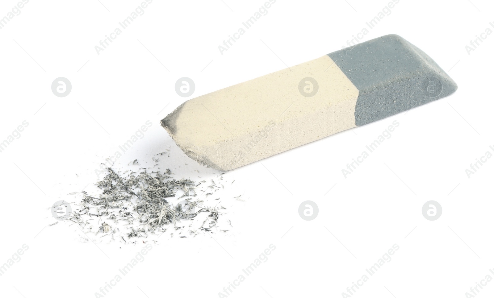 Photo of Double eraser and crumbs on white background