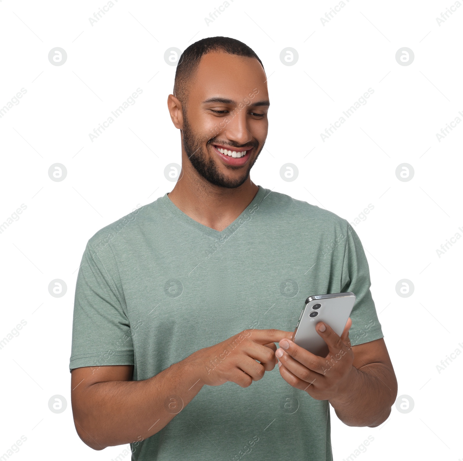 Photo of Happy man sending message via smartphone on white background