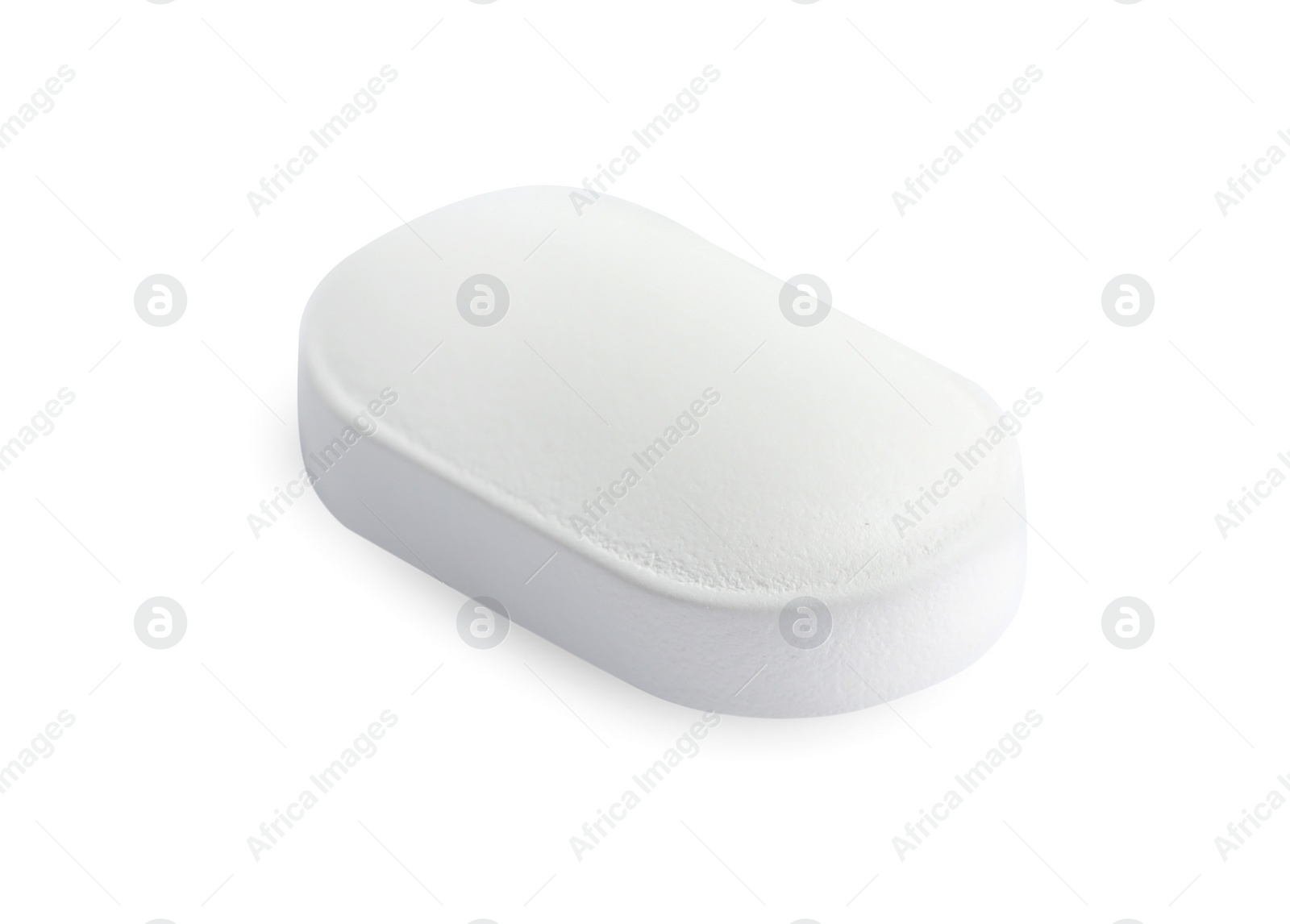 Photo of One pill on white background. Medicinal treatment