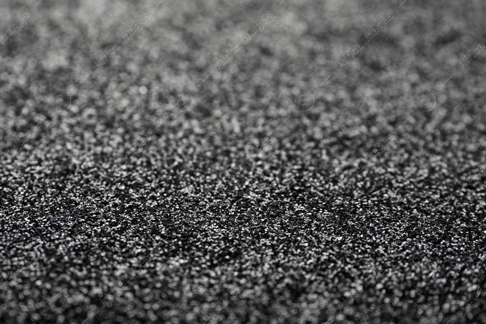 Photo of Shiny grey glitter as background. Bokeh effect