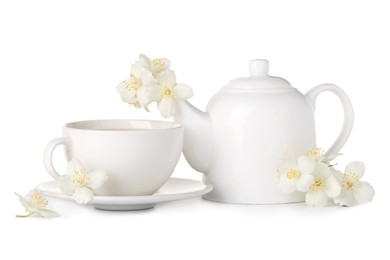 Photo of Aromatic herbal tea with jasmine flowers isolated on white
