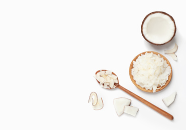 Composition with tasty coconut chips on white background, top view