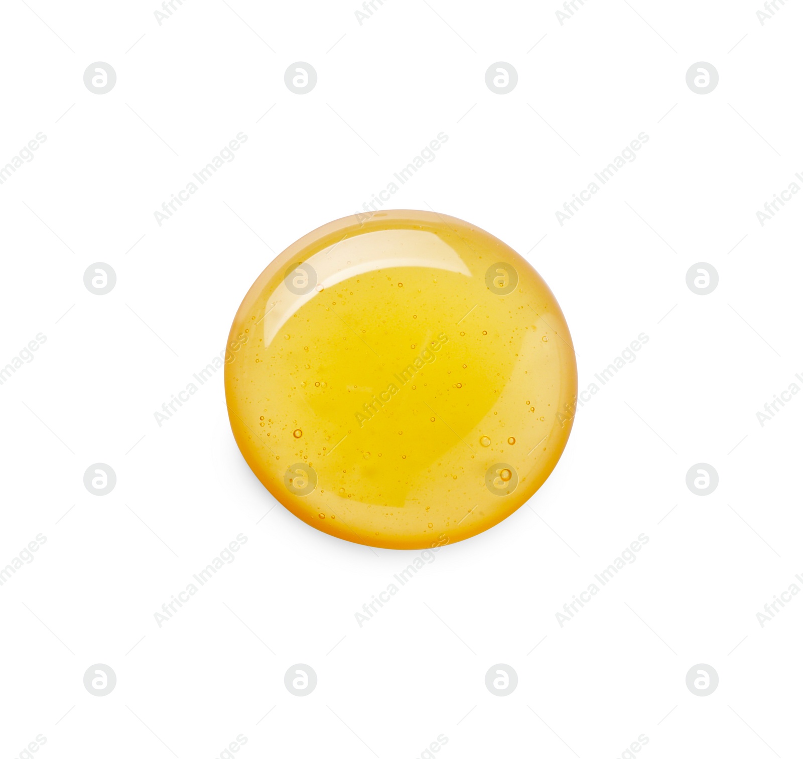 Photo of Drop of tasty natural honey isolated on white, top view