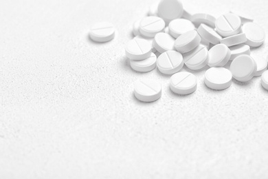 Photo of Pills on white background, closeup